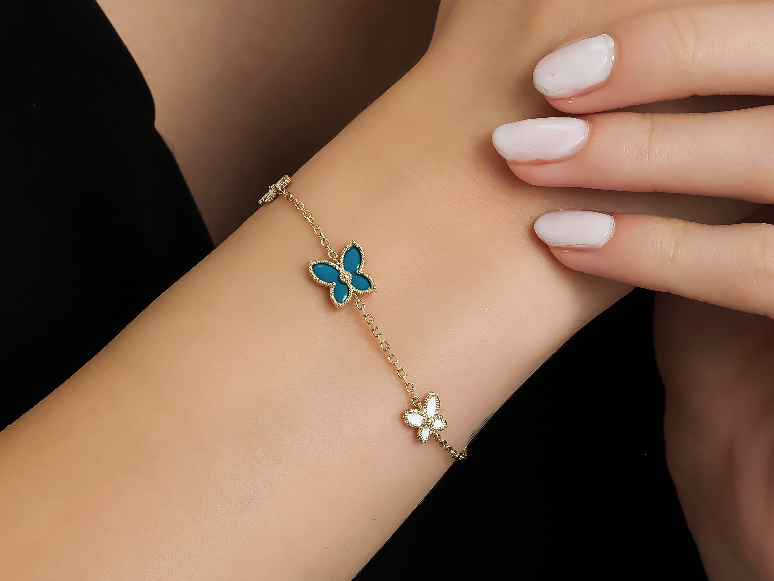 Van cleef butterfly best sale bracelet
