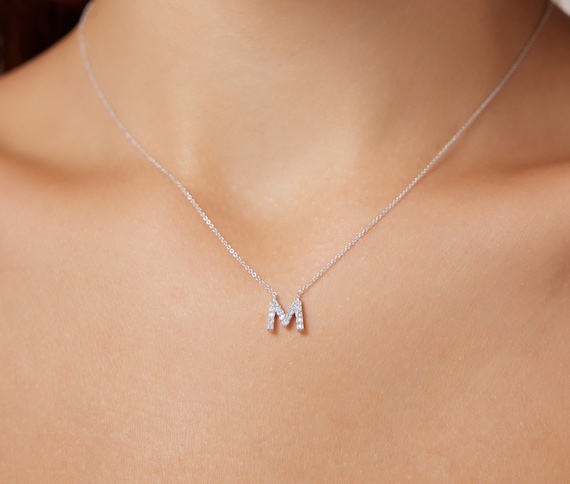 Delicate and sweet gorgeous designer V letter pendant necklace is set with  clear simulated diamonds in sterling silver bonded with platinum - Diamond  & Design