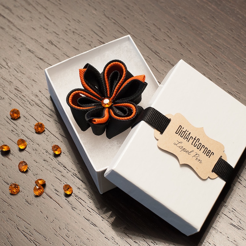 Orange and Black Mens Lapel Flower