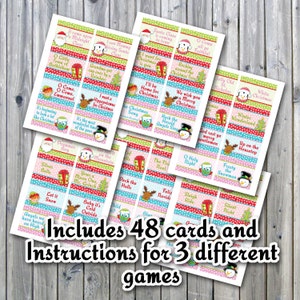 Peut inclure: Un jeu de 48 cartes de No&euml;l illustr&eacute;es de pingouins, hiboux, rennes et bonhommes de neige. Les cartes comprennent des phrases comme "O Holy Night", "Let it Snow" et "Grandma Got Run Over by a Reindeer". Le texte "Includes 48 cards and Instructions for 3 different games" est imprim&eacute; en bas de l'image.