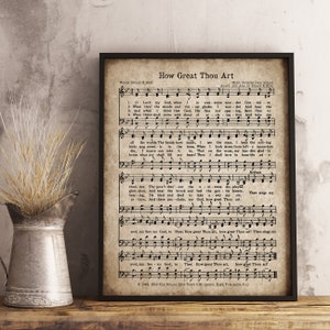 May include: A vintage-style printable sheet music for the hymn "How Great Thou Art". The sheet music is printed on a cream-colored paper with brown text and musical notes. The lyrics are printed in a traditional hymn style.