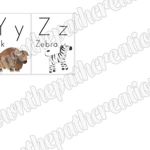 May include: A printable alphabet flashcard set featuring the letters Y and Z. The letter Y is paired with a brown yak and the letter Z is paired with a black and white zebra.