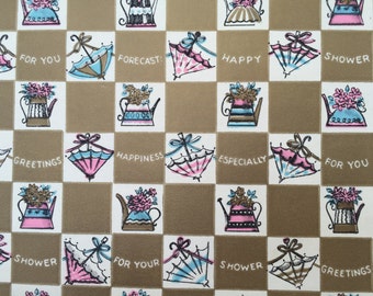 May include: A brown and white patterned wrapping paper with a repeating design of teapots, umbrellas, and the words "Happy", "Shower", "Forecast", "Greetings", "Happiness", "Especially", "For You", and "For Your".
