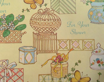 May include: A yellow and green patterned gift wrap with the text "For Your Shower" and images of butterflies, a birdcage, and gift boxes.