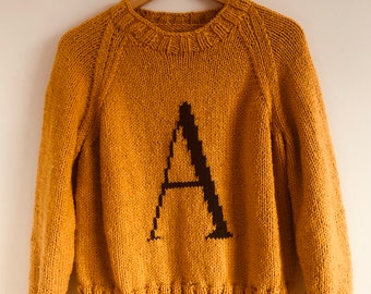 Letter Sweater Knitting Pattern, sizes small, medium and large. Chunky/bulky weight yarn.