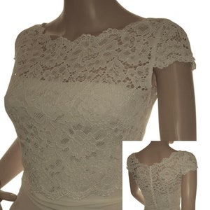 Women's ivory lace , button back capped sleeved bolero/jacket in sizes UK 8 to 18