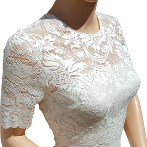 Women's Ivory cropped and stretch lace bolero/jacket and half sleeve in sizes 8 to 18 UK image 2