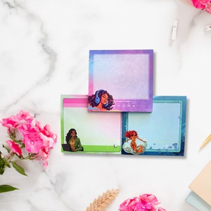 May include: Three colorful sticky notes with different illustrations. The top note is purple and pink with a woman wearing headphones. The middle note is green and blue with a woman sitting at a computer. The bottom note is blue and green with a woman swimming in the ocean.