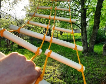 fun playground rope ladder, metal mounts on each end