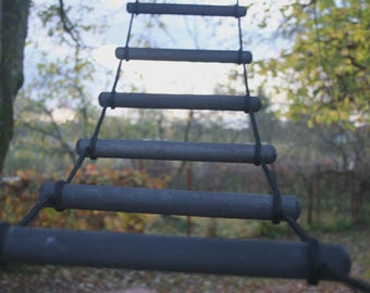 Long rope ladder for hard to access places and playgrounds