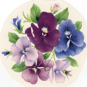 May include: A floral design featuring pansies in shades of purple, blue, and lavender, with green leaves and small blue flowers. The pansies are arranged on a cream-coloured background.
