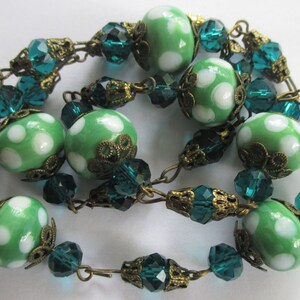 vintage art glass bead necklace green white polka dot faceted teal crystal brass flower endcaps barrel clasp