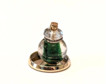 Miniatura de casa de muñecas, tarro de tocador verde con bandeja