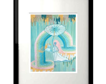 May include: A framed art print featuring a whimsical illustration. A figure with pink hair and a white dress stands under a light blue umbrella, with a rainbow arching above. A white rabbit is held in the figure's arms. The background is a light teal color.