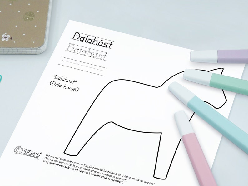 May include: A printable coloring page featuring a Dalah&auml;st, a traditional Swedish wooden horse. The page includes the Swedish word "Dalah&auml;st" and its English translation "Dala horse".