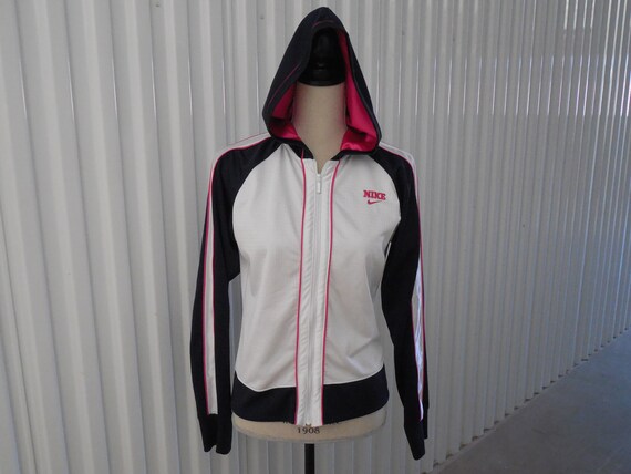 pink black and white nike jacket