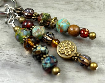 Handmade Beaded Bag Charm: Vintage Style Purse Accessory with Embossed Flower