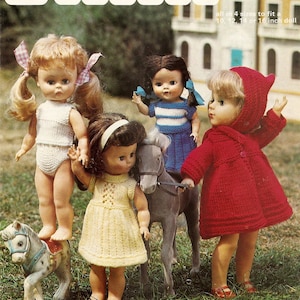 May include: Four dolls wearing knitted clothes. The dolls are playing with a rocking horse and a gray horse. The image includes the text "PATONS Doll's Clothes" and "all in 4 sizes to fit a 10, 12, 14 or 16 inch doll."