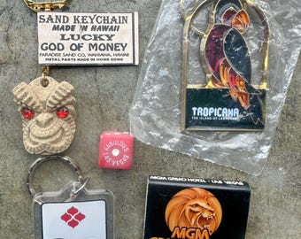 Vintage Las Vegas Tropicana Tiki God Keychain, Dunes Keychain, Tropicana Parrot, MGM Grand Matchbook, Dice