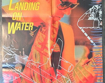 VTG Neil Young 1986 Landing On Water 23x32 Promo Poster Folded with small hole