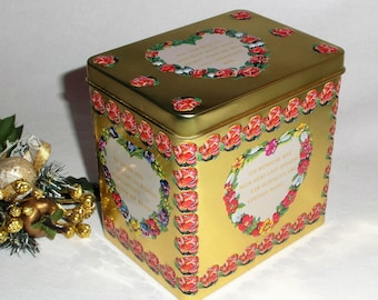 Tin can with music box melody gold-colored tin with heart flower relief decoration