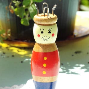 Old knitting doll cheerful wooden doll traditional costume doll handmade red blue painted image 3