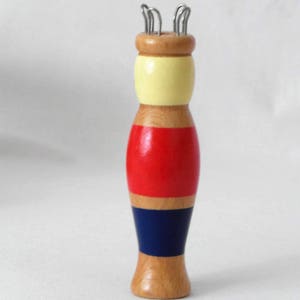 Old knitting doll cheerful wooden doll traditional costume doll handmade red blue painted image 2