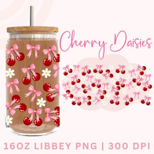 May include: A glass tumbler with a wooden lid and a silver straw. The tumbler features a pattern of red cherries with pink bows and white daisies. The words "Cherry Daisies" are written in pink script. The tumbler is 16oz.