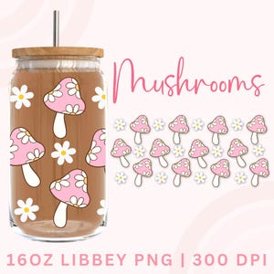 May include: A 16oz clear glass tumbler with a brown lid and a straw. The tumbler is decorated with pink mushrooms and white daisies. The text "Mushrooms" is written in pink at the top of the image.