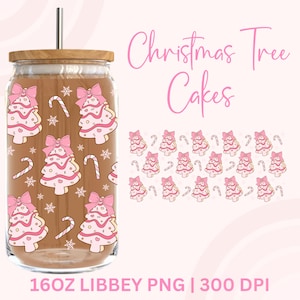 May include: A clear glass tumbler with a wooden lid and a silver straw. The tumbler has a repeating pattern of pink Christmas tree designs with bows and candy canes. The text "Christmas Tree Cakes" is in pink script.