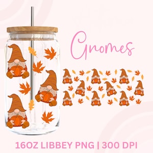 May include: A clear glass tumbler with a wooden lid and a silver straw. The tumbler features a repeating pattern of cartoon gnomes holding pumpkins and orange fall leaves. The word "Gnomes" is written in pink script.