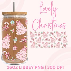 May include: A glass tumbler with a wooden lid and a silver straw. The tumbler is decorated with pink Christmas trees, candy canes, and other festive graphics. The words "Lovely Christmas" are written in pink script.