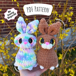 May include: Two plush bunny toys, one in pastel rainbow colors and the other in brown, with large, glittery eyes and white accents. The image includes text that reads "PDF PATTERN" and "No Sewing Required".