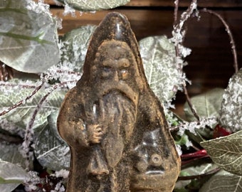 Small Blackened Beeswax Santa with Satchel of Fruit