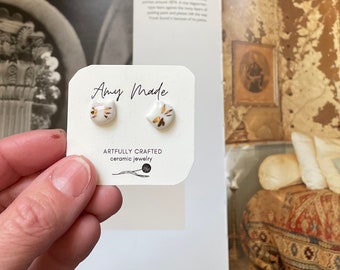 Ceramic porcelain meow cat earrings with gold luster glaze as whiskers