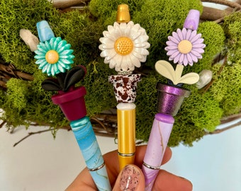 Springtime floral gifts. These bright and colorful marbled pens are reusable and refillable. Opal Potted flowers, beaded pen.