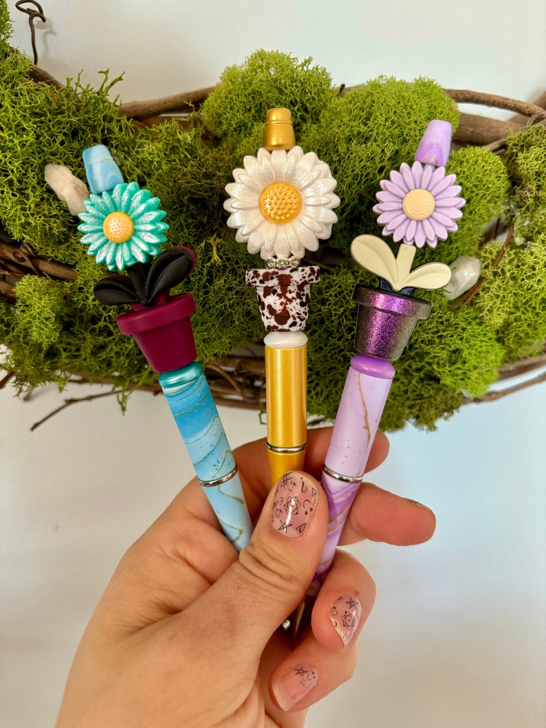 Springtime floral gifts. These bright and colorful marbled pens are reusable and refillable. Opal Potted flowers, beaded pen. image 1