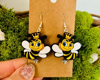 Sassy queen bee, silicone beaded earrings. Lightweight, one of a kind gift. Made with 925 sterling silver ear wire and hypoallergenic.