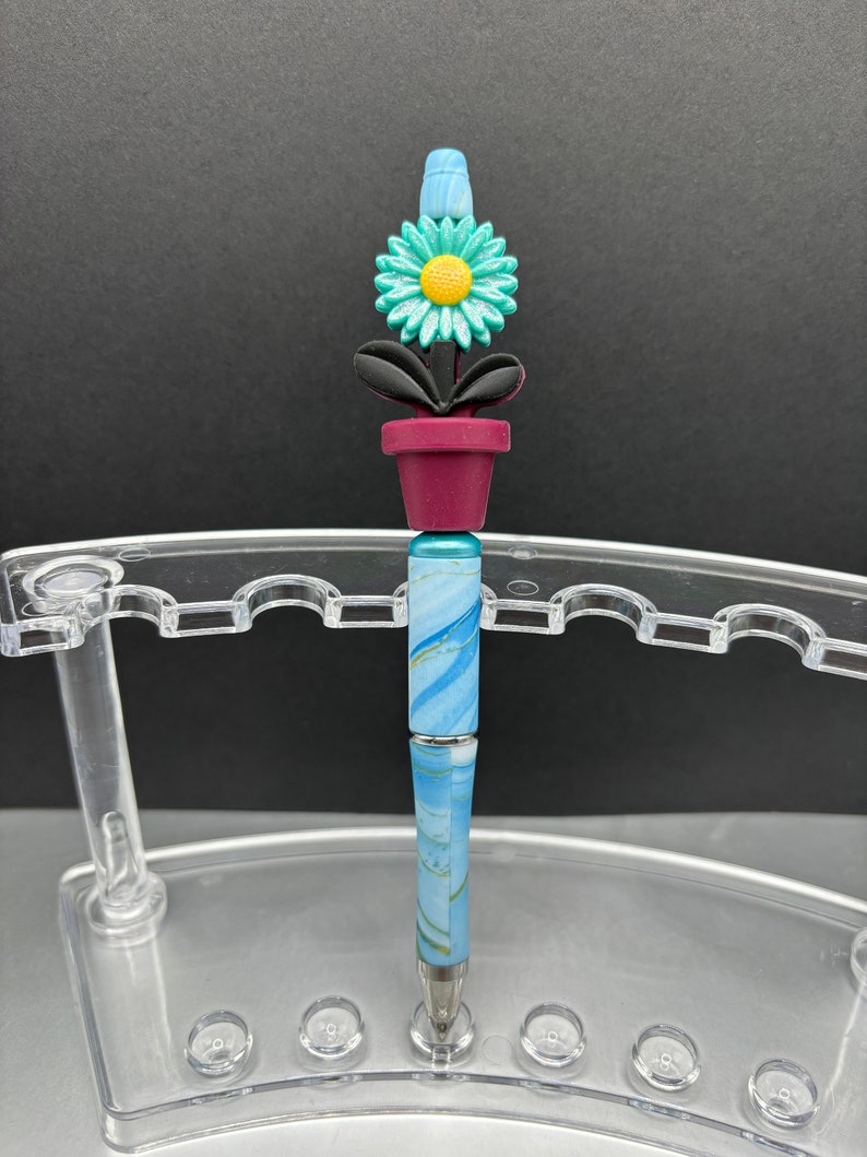 Springtime floral gifts. These bright and colorful marbled pens are reusable and refillable. Opal Potted flowers, beaded pen. Blue pen base