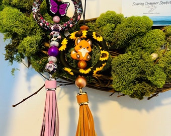 Cute car accessory, car charms with sunflower, foxes, purple monarch butterflies and colored tassels. Adjustable clasps!