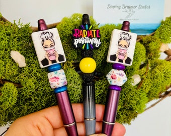 Boss babe, positive message, radiate positivity refillable, reusable ink pens. Floral and vibrant colors.