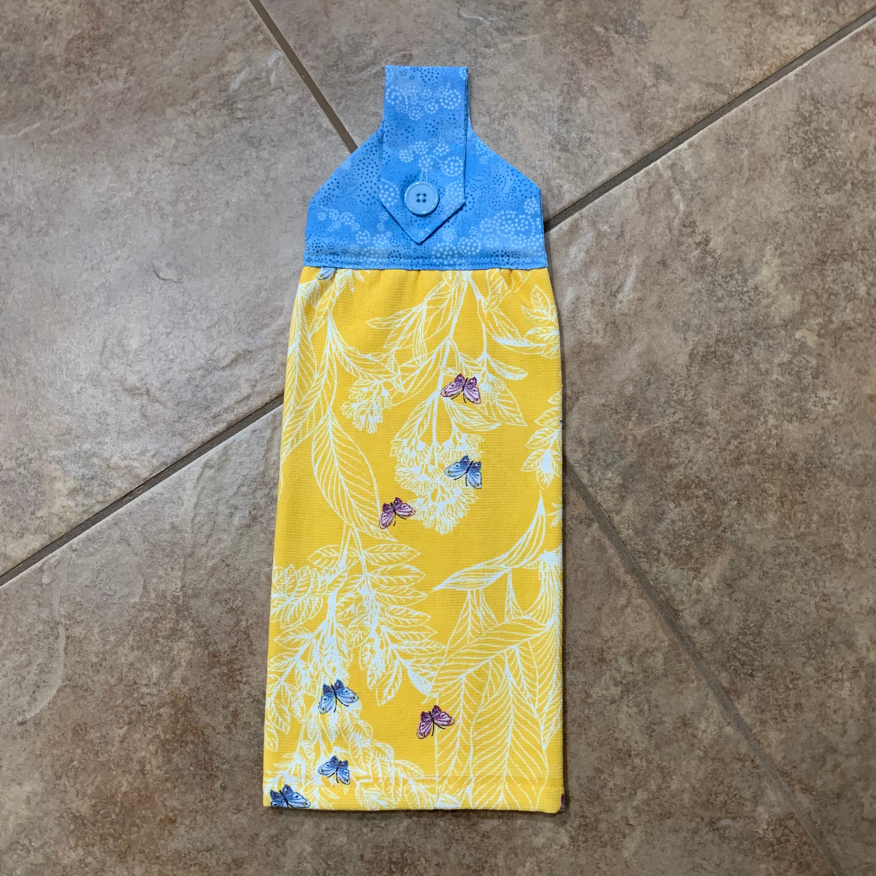 blue and yellow hand towels