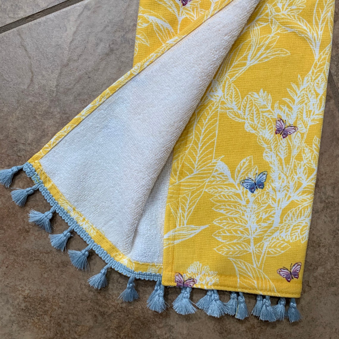 blue and yellow hand towels