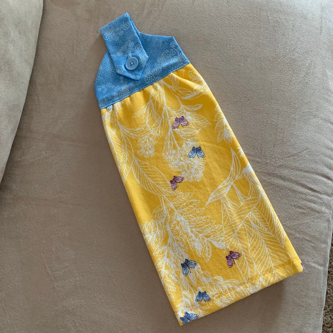 blue and yellow hand towels