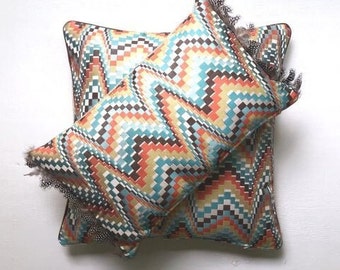 Blauwgroen, oranje, bruin, natuurlijk zigzagkussen