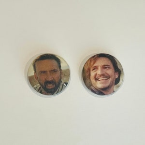 Pedro pascal and nic cage earrings