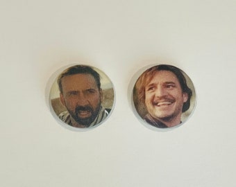 Pedro pascal and nic cage earrings