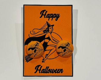vintage orange flying witch earrings
