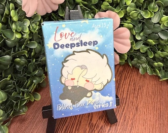Spille a scatola con scritta "Love and Deepsleep"