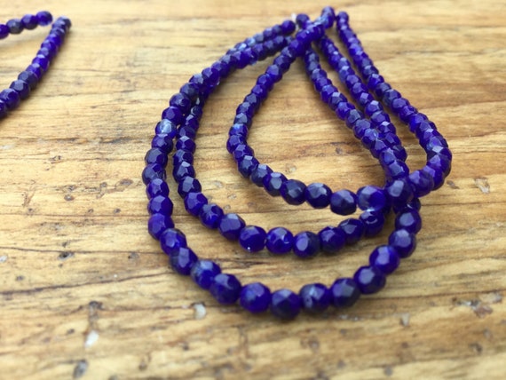 Czech Fire Polished Round Faceted Beads in Deep Tanzanite color 16/" strand